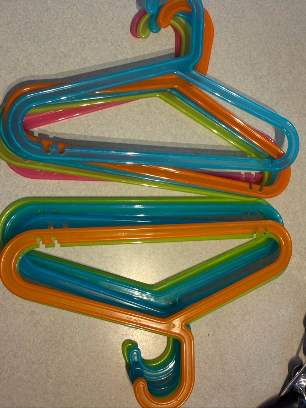 IKEA Kids Plastic Hangers in Blue, Orange, Green, Pink